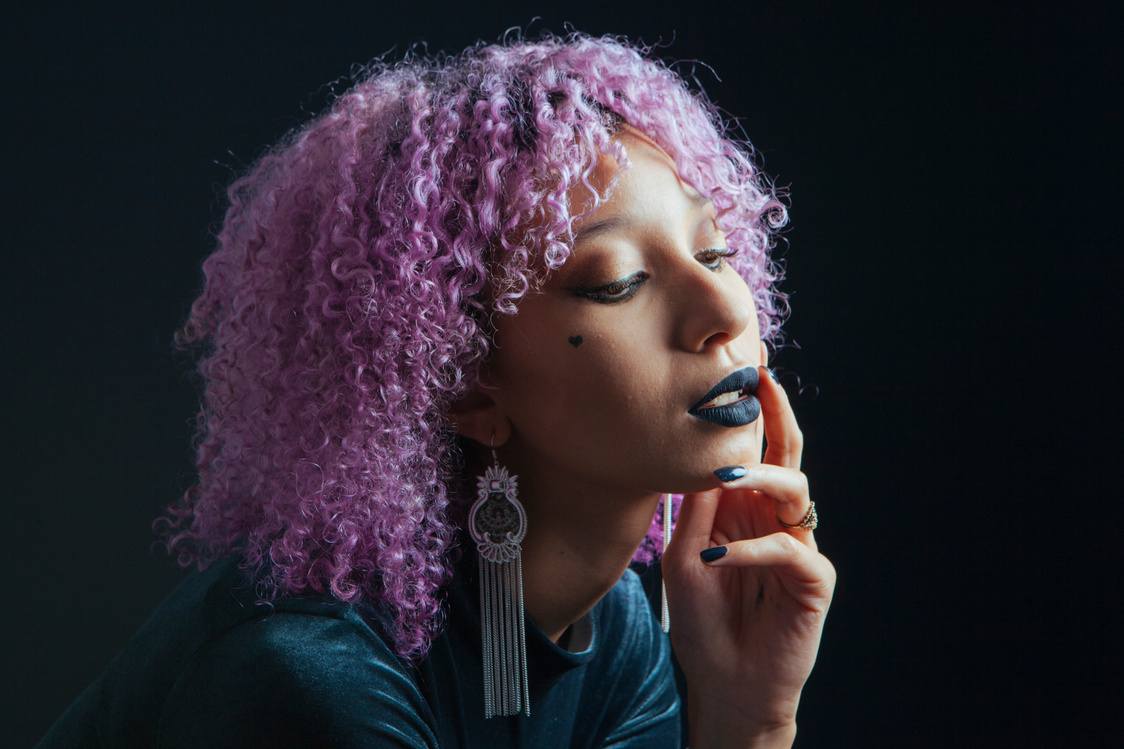 Afro Woman with Purple Curly Hair